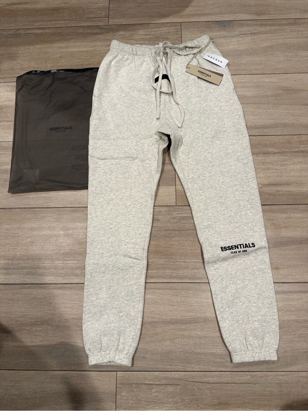 Fear of God ESSENTIALS Light Gray Men’s Sweatpants - Logo